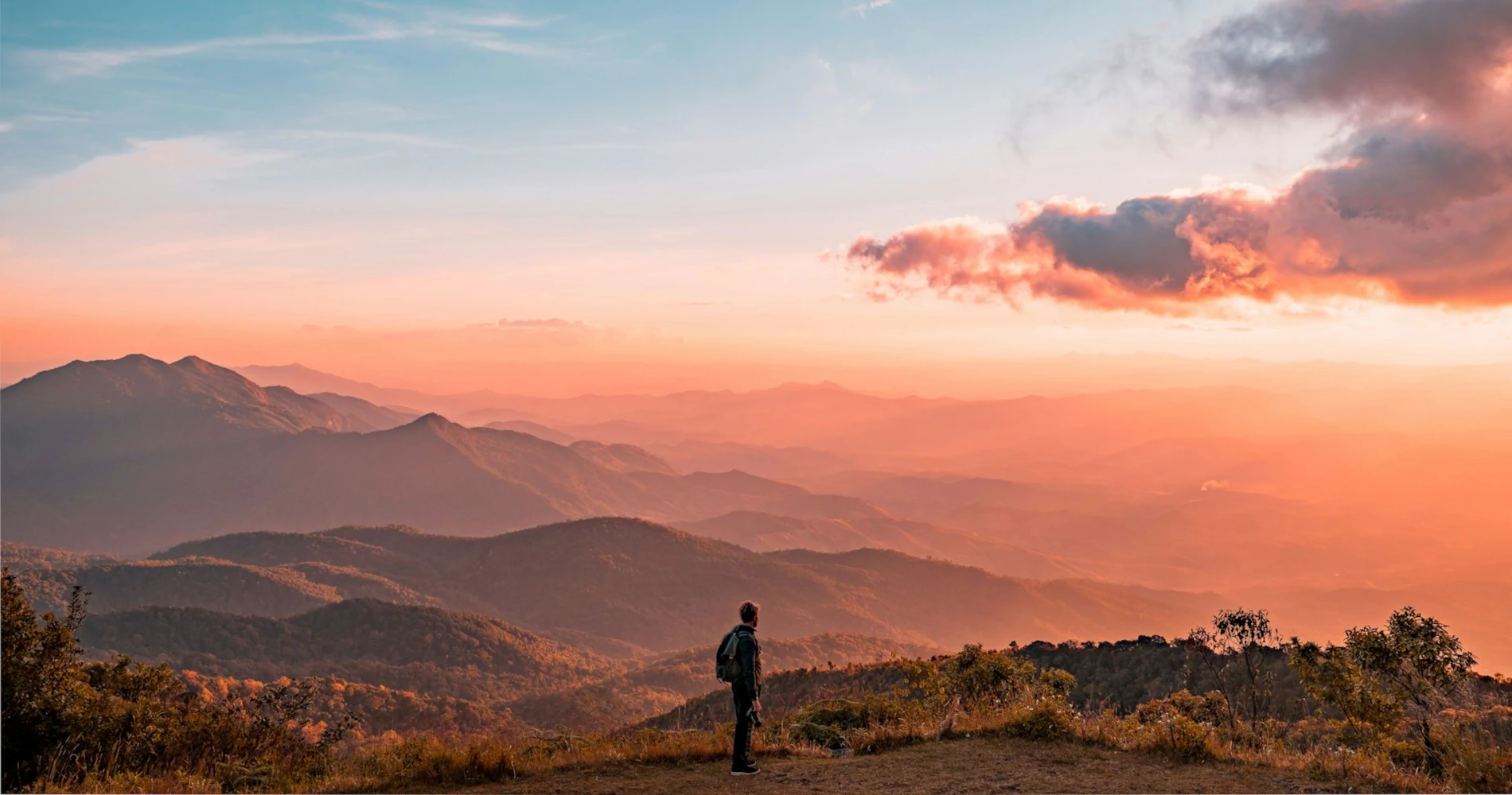A man standing on a hill A man standing on a hill