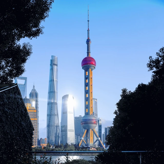 Shanghai's famous skyscrapers in the morning, with some of them reflecting the sunlight down onto the ground